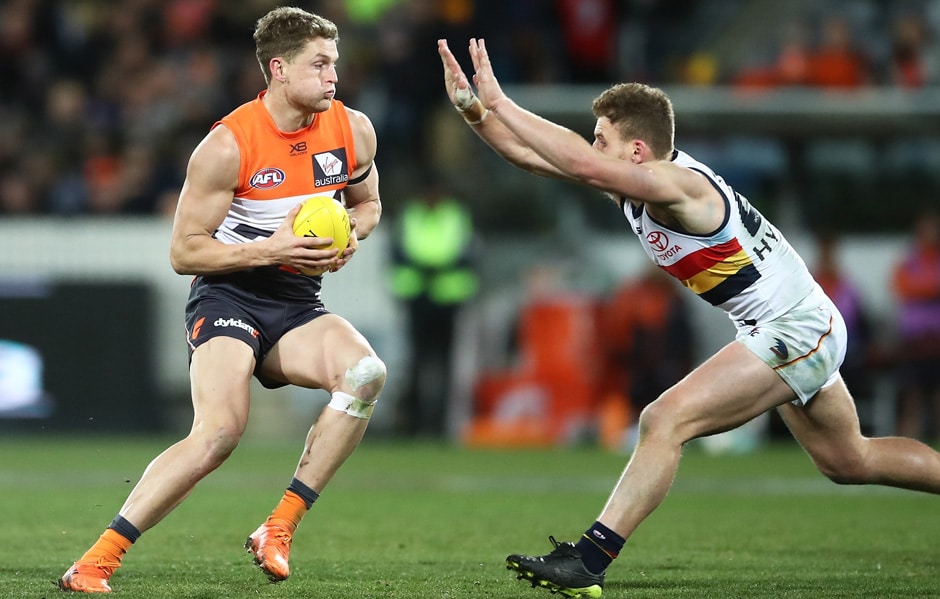 Jacob Hopper in action against the Crows in 2018. The GIANTS will take on the Crows at UNSW Canberra Oval in Friday night's JLT Community Series clash. - AFL,JLT Series,GWS Giants,Adelaide Crows,UNSW Canberra Oval